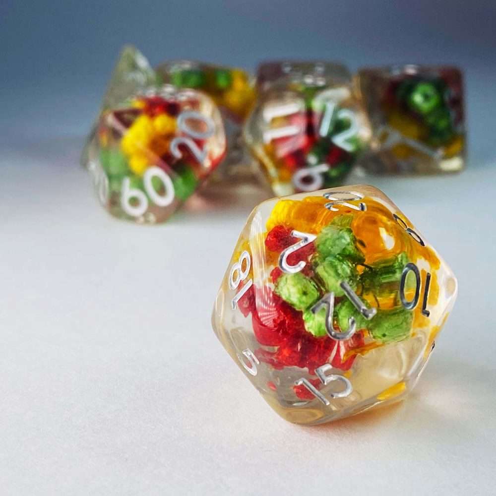 Sage's Cantrips - Transparent Red/Yellow/Green Flowers Resin Polyhedral Dice Set image 1