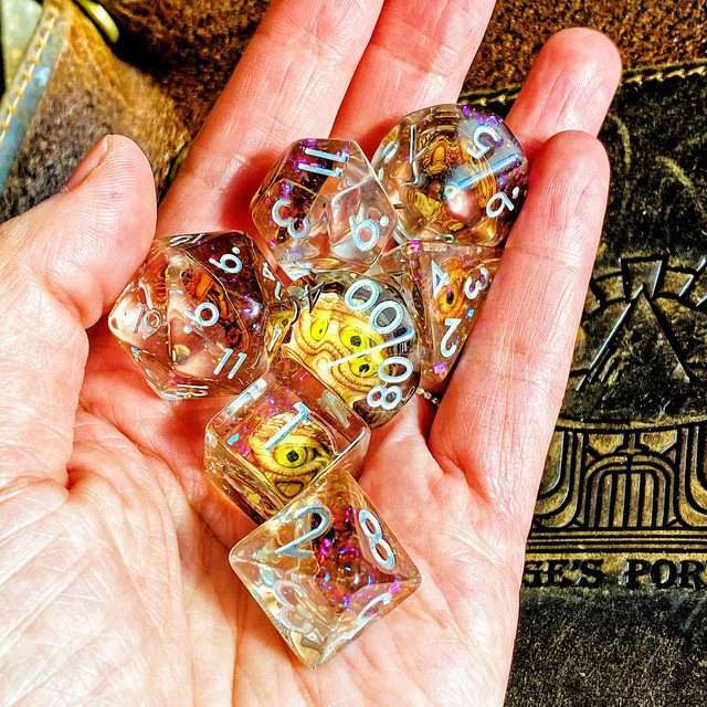 Sage's Bottled Gold Dragon Eyes Resin Polyhedral Dice Set image 7