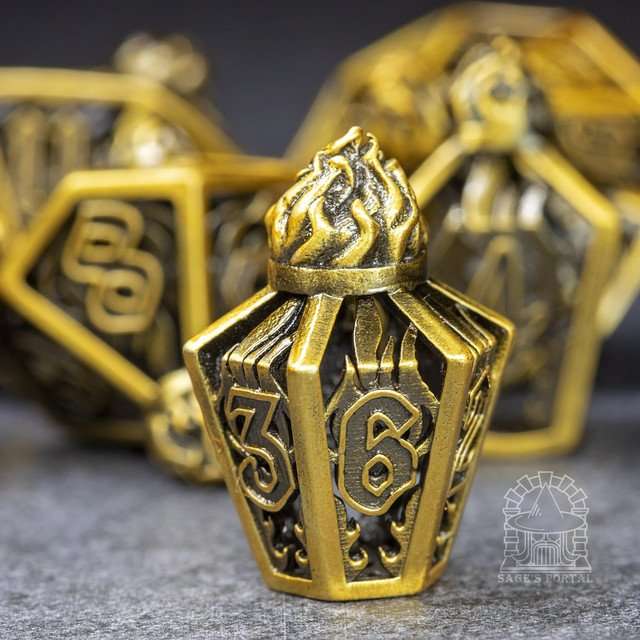 Sage’s Phoenix Lantern Hollow Metal Polyhedral Dice Set image 0