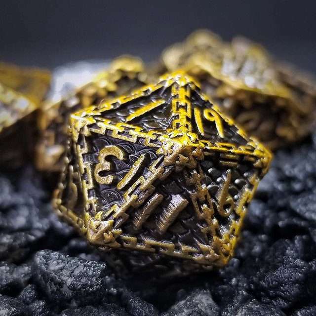 Sage's Dragonstones - Chained Drake Gold Black Metal Polyhedral Dice Set image 0