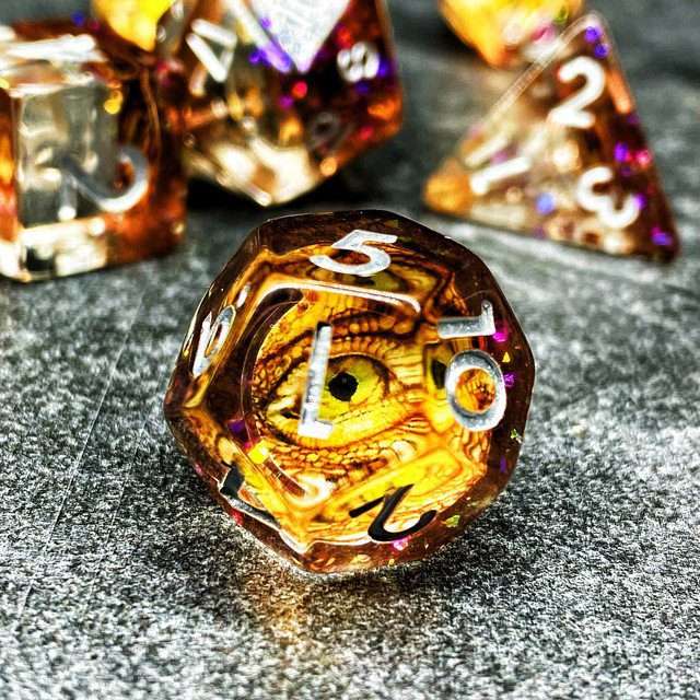 Sage's Bottled Gold Dragon Eyes Resin Polyhedral Dice Set image 2