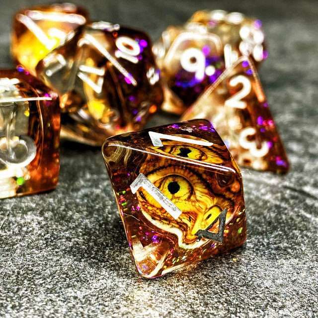 Sage's Bottled Gold Dragon Eyes Resin Polyhedral Dice Set image 5