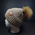 Sage’s Cap – Mocha Knit Beanie with Raccoon Pompom image 0