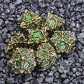 Sage's Deadly Lotus Venomous Bite Metal Polyhedral Dice Set image 0