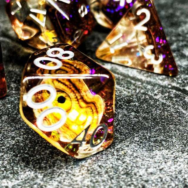 Sage's Bottled Gold Dragon Eyes Resin Polyhedral Dice Set image 4