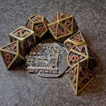 Sage's Grim's Fortunes - Bronze Red Ink Reaper Hollow Metal Polyhedral Dice Set image 0