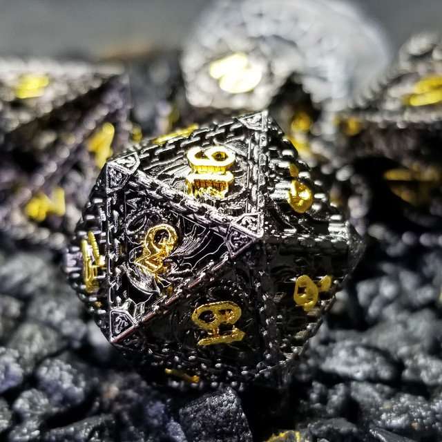 Sage's Dragonstones - Mystic Wyvern Black and Gold Metal Polyhedral Dice Set image 0
