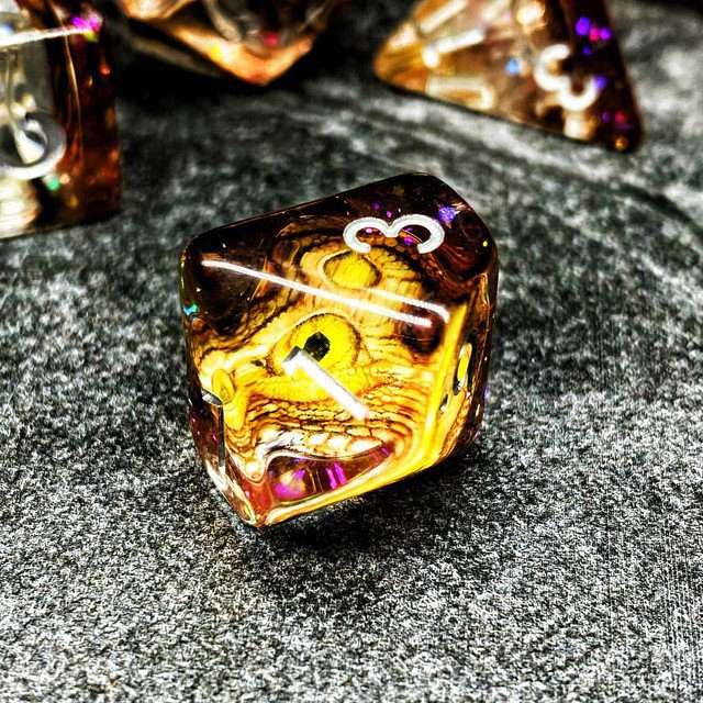 Sage's Bottled Gold Dragon Eyes Resin Polyhedral Dice Set image 8
