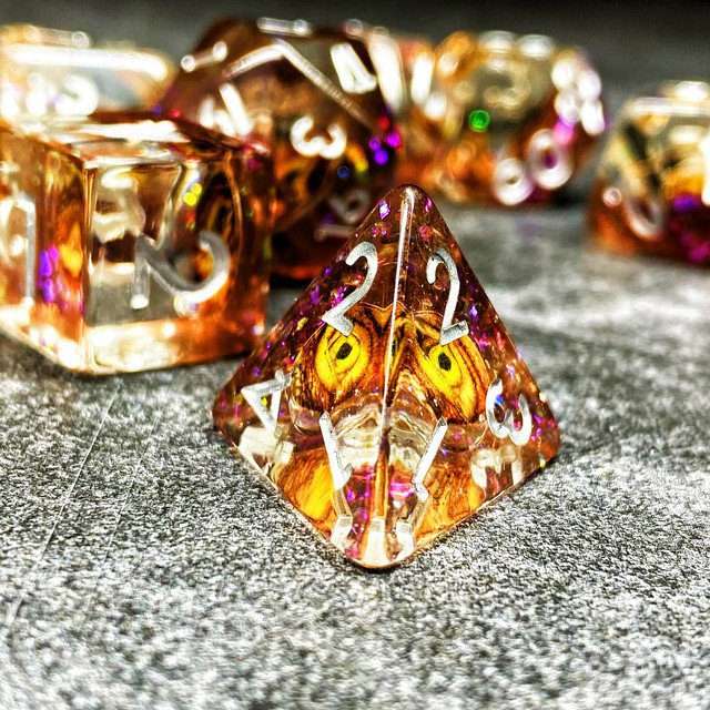 Sage's Bottled Gold Dragon Eyes Resin Polyhedral Dice Set image 3