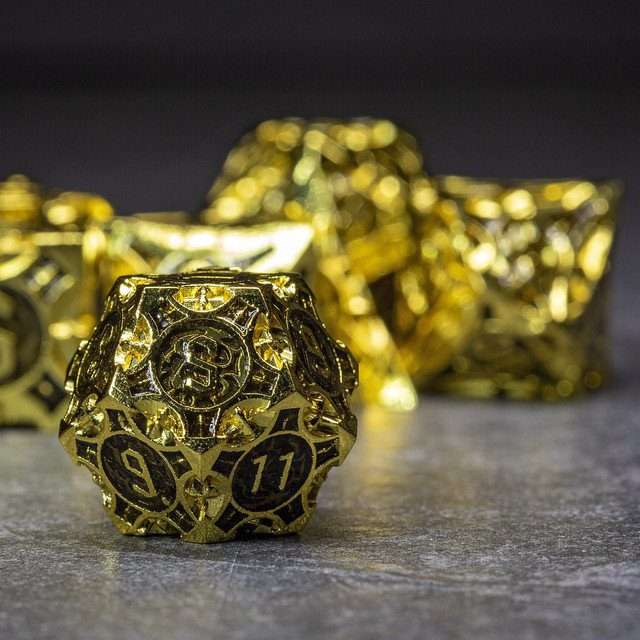 Sage’s Runic Caltrops Gold/Black Metal Polyhedral Dice Set image 1
