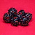 Sage’s Ouroboros Crimson Midnight Hollow Metal Polyhedral Dice Set image 0
