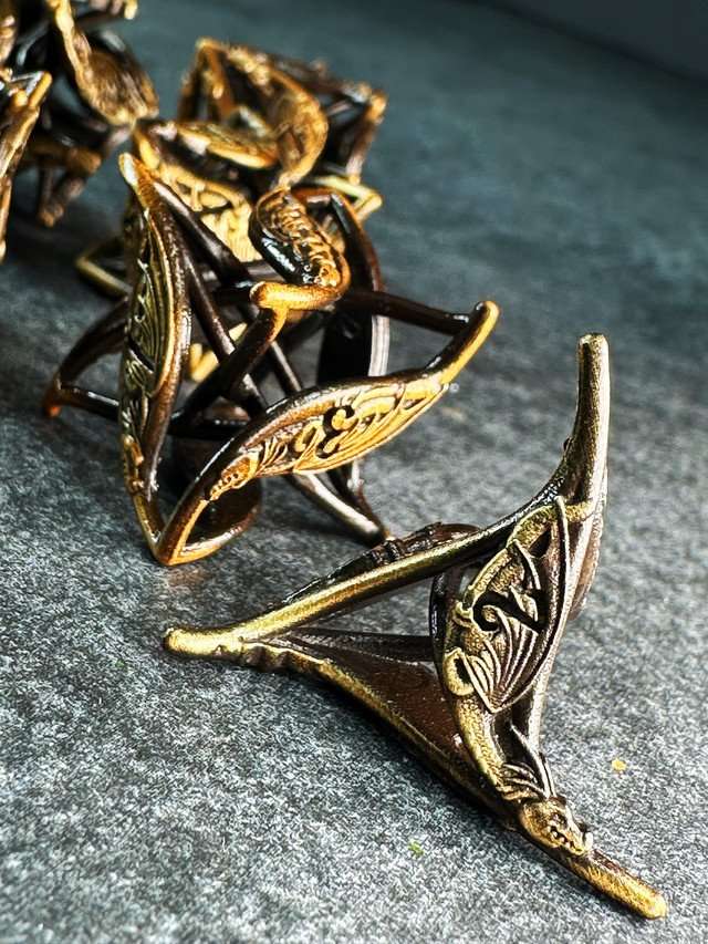 Sage’s Soaring Wyvern Hollow Metal Polyhedral Dice Set image 1