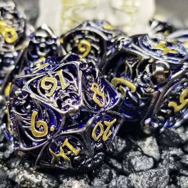 Sage's Macabre Bone Trinket Midnight Blue Inlay Black/Gold Ink Hollow Metal Polyhedral Dice Set image 0
