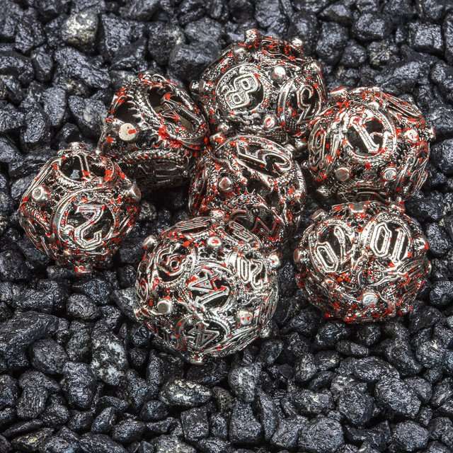 Sage’s Ouroboros Nickel Carnage Hollow Metal Polyhedral Dice Set image 1