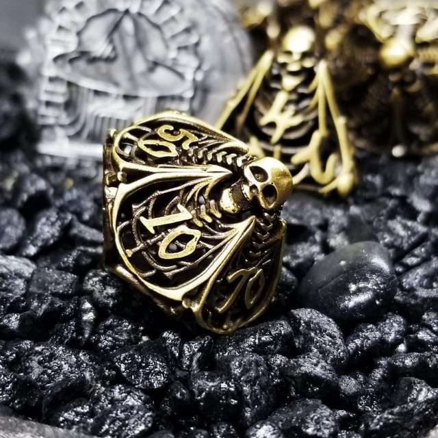 Sage's Macabre Bone Trinket Bronze Hollow Metal Polyhedral Dice Set image 0