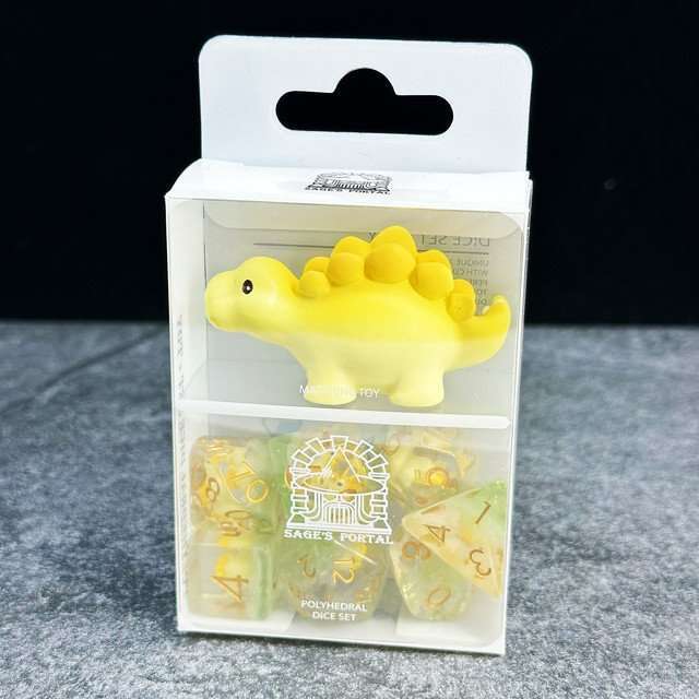 Sage's Familiars - Yellow Baby Stegosaurus Resin Polyhedral Dice Set - Dice + Toy image