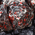 Sage’s Runic Caltrops Nickel Blood Splatter Solid Metal Polyhedral Dice Set