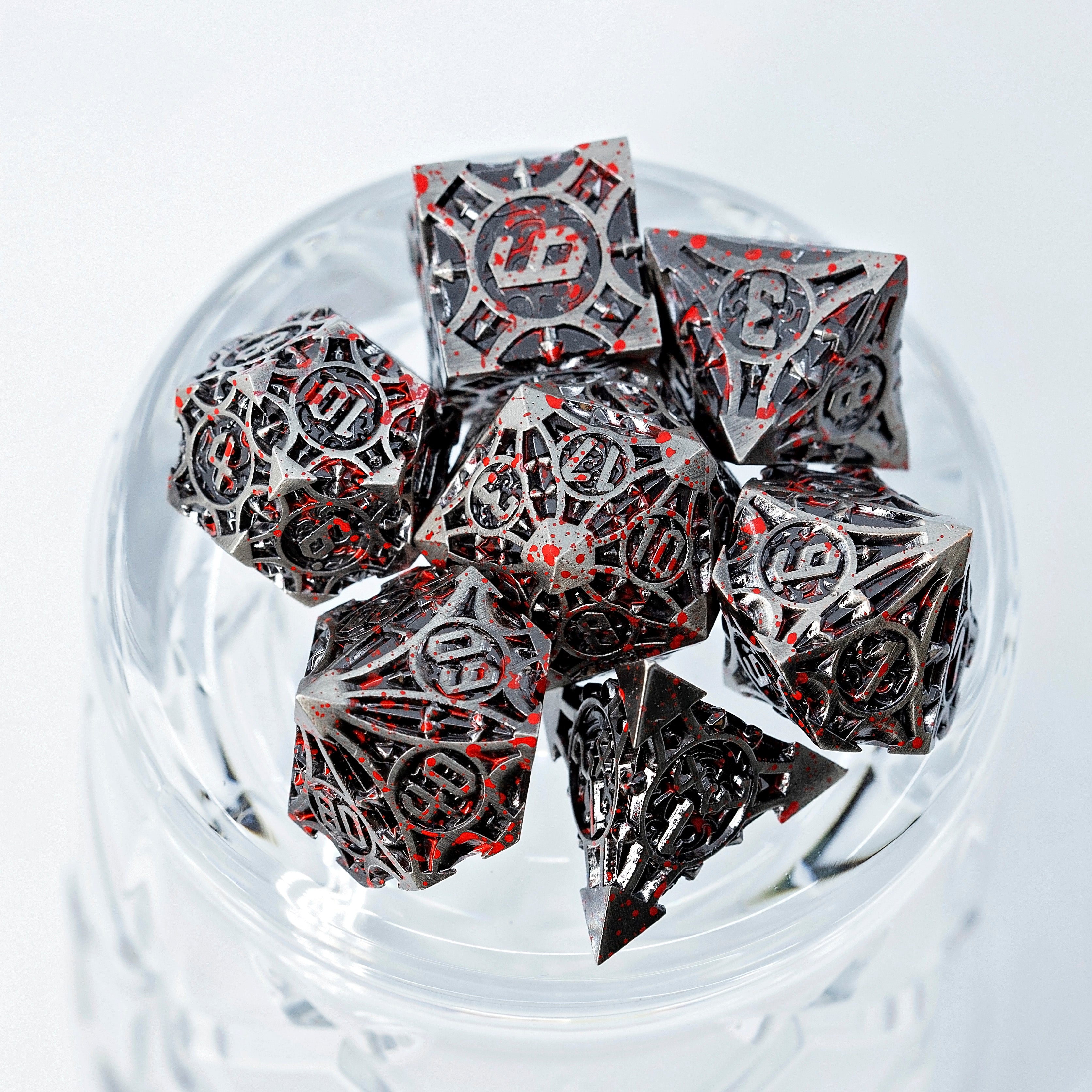 Sage’s Runic Caltrops Nickel Blood Splatter Solid Metal Polyhedral Dice Set