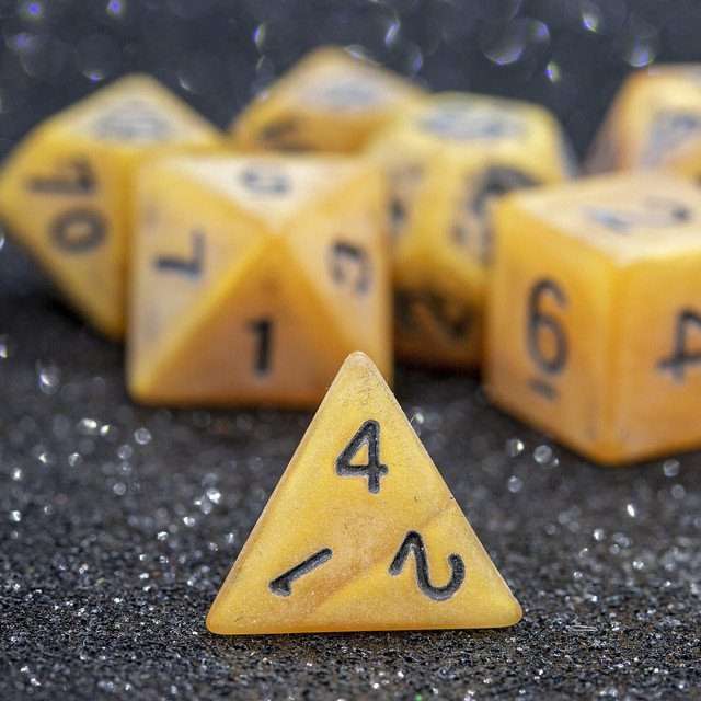 Sage's Ancient Golden Stone Black Ink Acrylic Polyhedral Dice Set - Sage's PortalAcrylic Dice Set