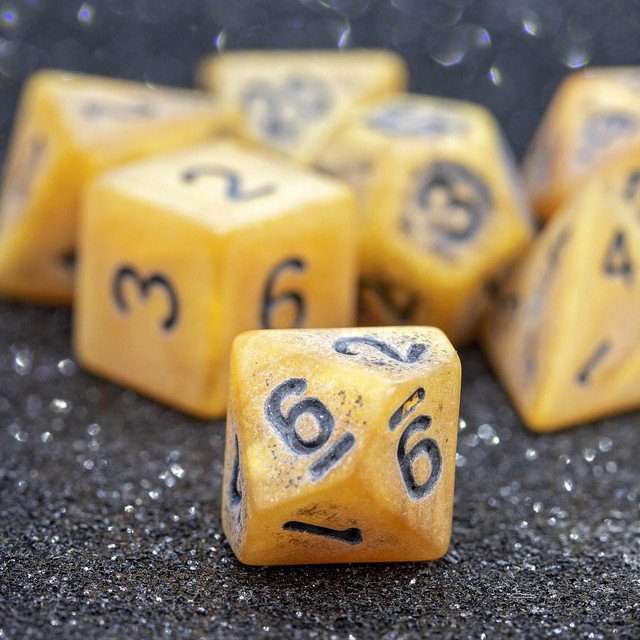 Sage's Ancient Golden Stone Black Ink Acrylic Polyhedral Dice Set - Sage's PortalAcrylic Dice Set