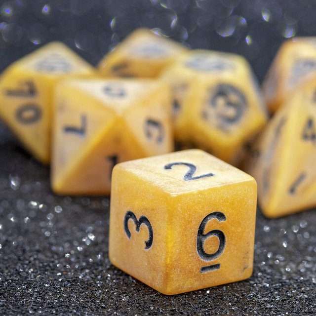 Sage's Ancient Golden Stone Black Ink Acrylic Polyhedral Dice Set - Sage's PortalAcrylic Dice Set