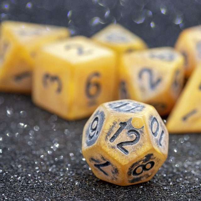 Sage's Ancient Golden Stone Black Ink Acrylic Polyhedral Dice Set - Sage's PortalAcrylic Dice Set