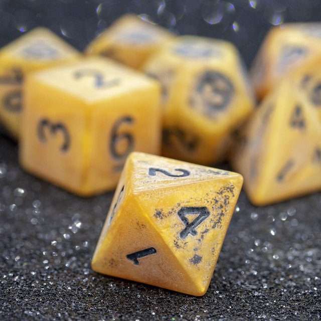 Sage's Ancient Golden Stone Black Ink Acrylic Polyhedral Dice Set - Sage's PortalAcrylic Dice Set