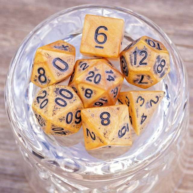 Sage's Ancient Golden Stone Black Ink Acrylic Polyhedral Dice Set - Sage's PortalAcrylic Dice Set