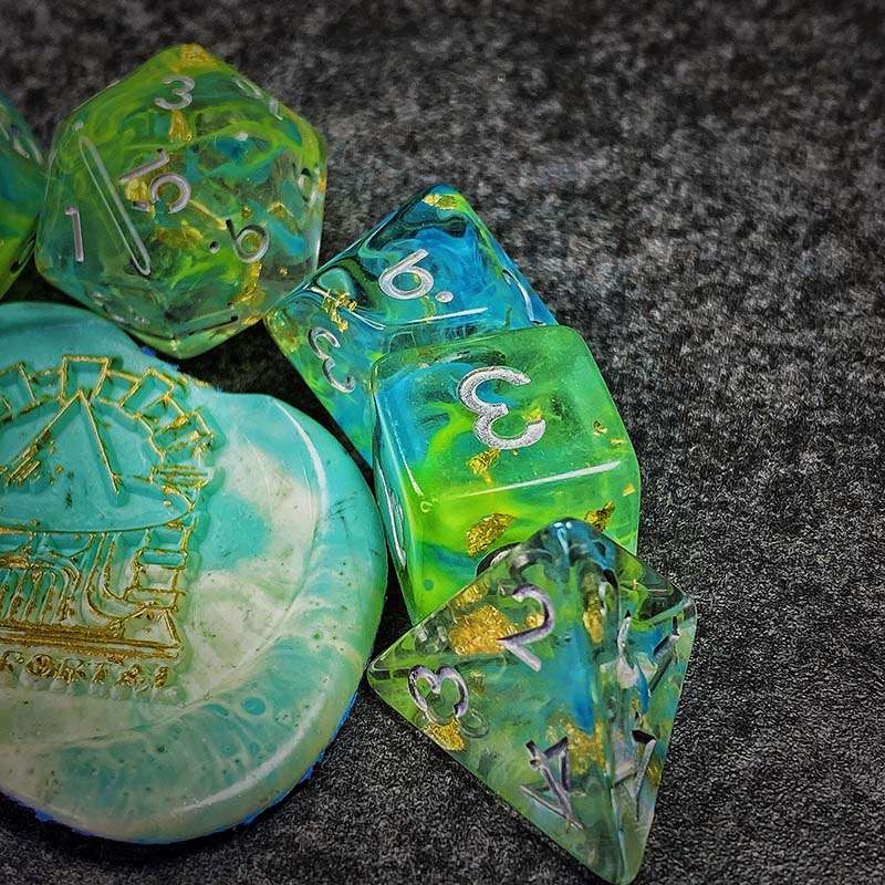 Sage's Cantrips - Green/Blue Swirl Gold Flakes Silver Ink Resin Polyhedral Dice Set - Sage's PortalResin Dice Set
