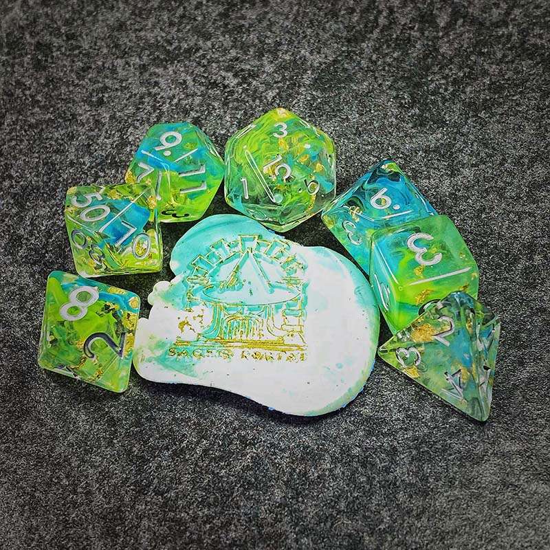 Sage's Cantrips - Green/Blue Swirl Gold Flakes Silver Ink Resin Polyhedral Dice Set - Sage's PortalResin Dice Set