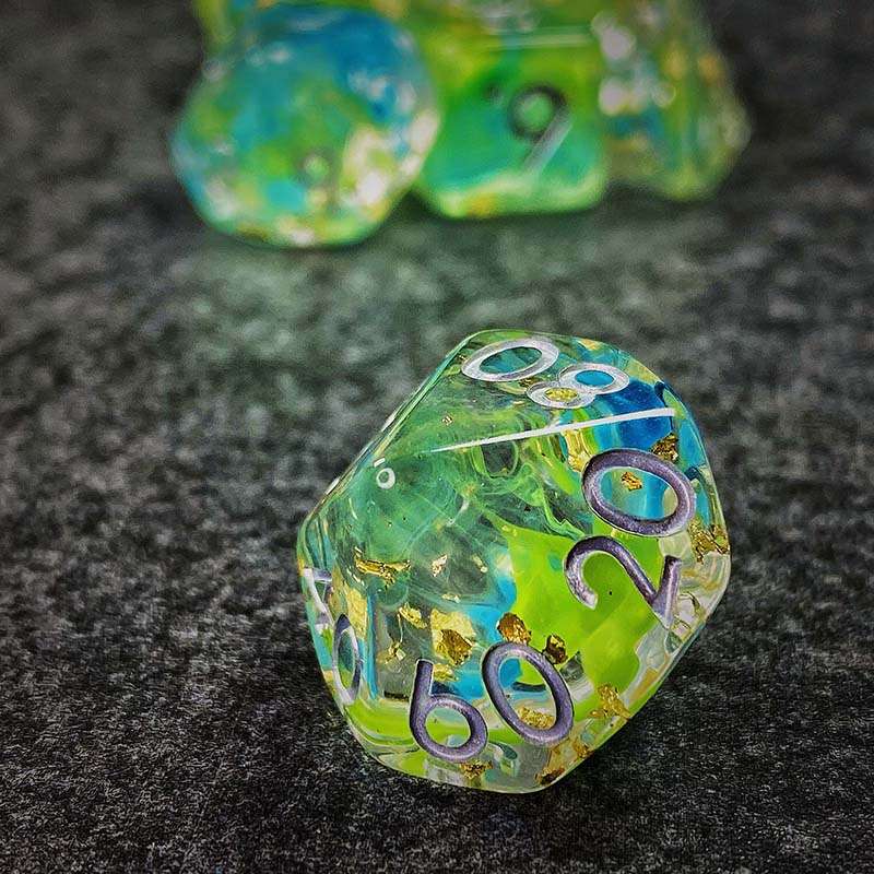 Sage's Cantrips - Green/Blue Swirl Gold Flakes Silver Ink Resin Polyhedral Dice Set - Sage's PortalResin Dice Set