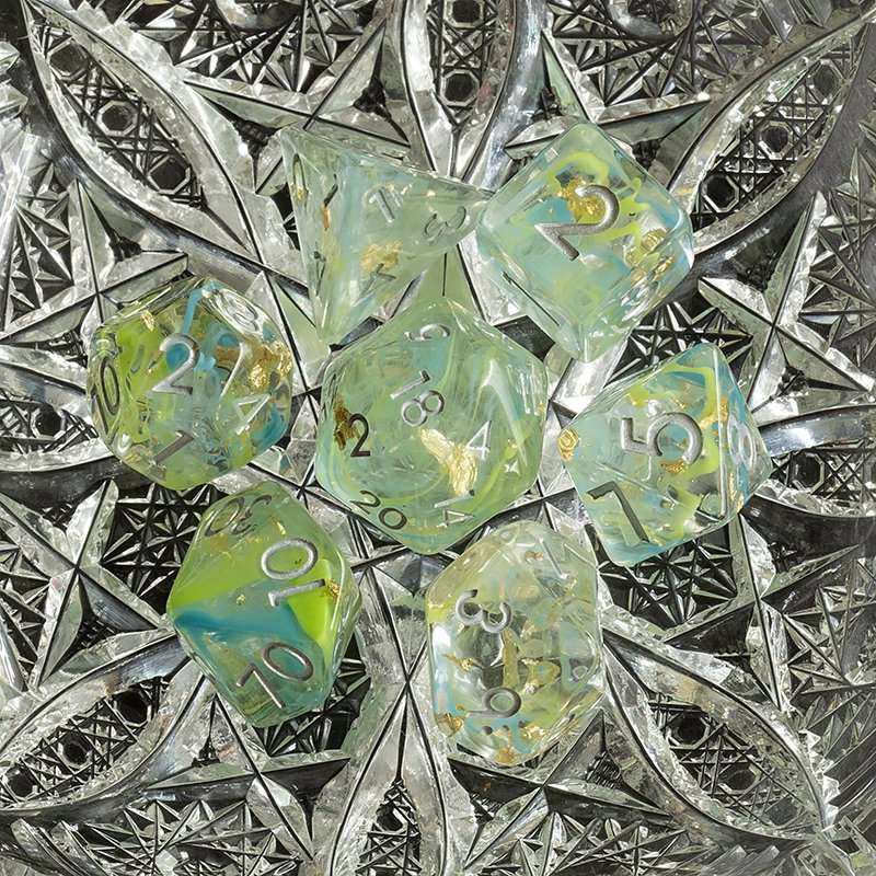 Sage's Cantrips - Green/Blue Swirl Gold Flakes Silver Ink Resin Polyhedral Dice Set - Sage's PortalResin Dice Set