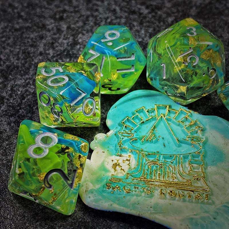 Sage's Cantrips - Green/Blue Swirl Gold Flakes Silver Ink Resin Polyhedral Dice Set - Sage's PortalResin Dice Set