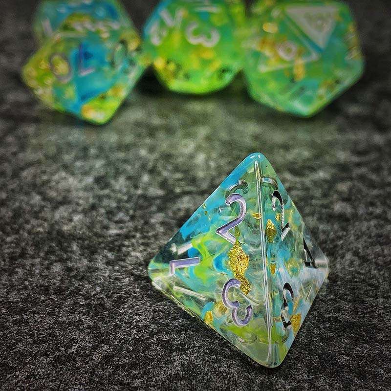 Sage's Cantrips - Green/Blue Swirl Gold Flakes Silver Ink Resin Polyhedral Dice Set - Sage's PortalResin Dice Set