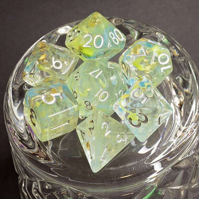 Sage's Cantrips - Green/Blue Swirl Gold Flakes Silver Ink Resin Polyhedral Dice Set - Sage's PortalResin Dice Set
