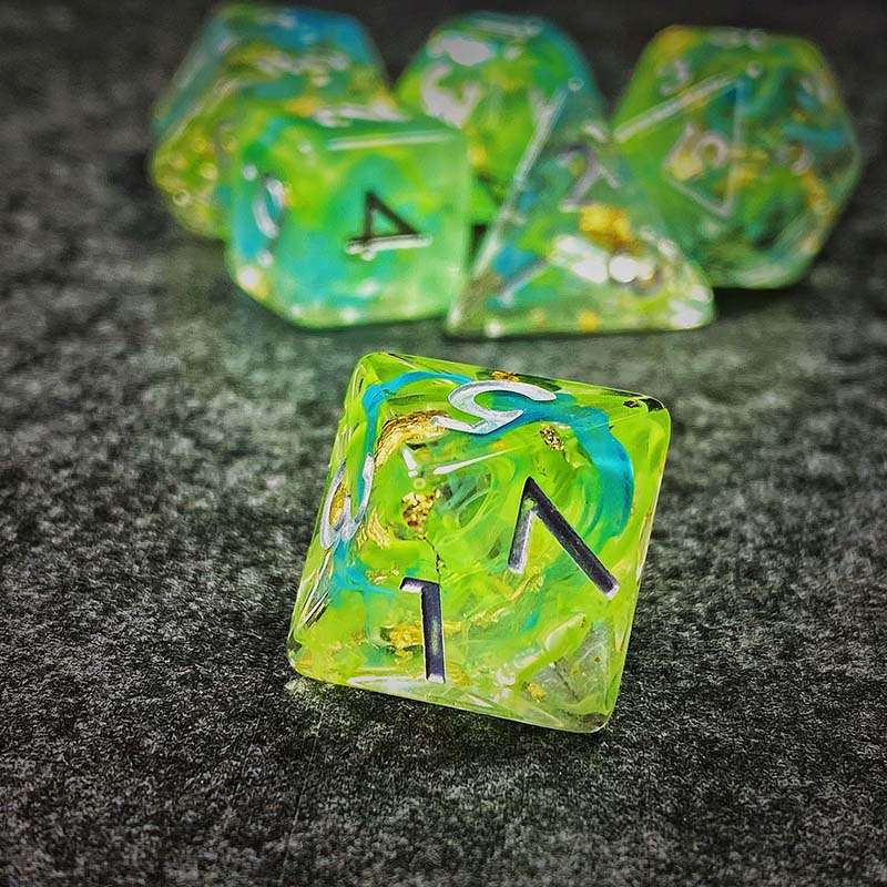 Sage's Cantrips - Green/Blue Swirl Gold Flakes Silver Ink Resin Polyhedral Dice Set - Sage's PortalResin Dice Set