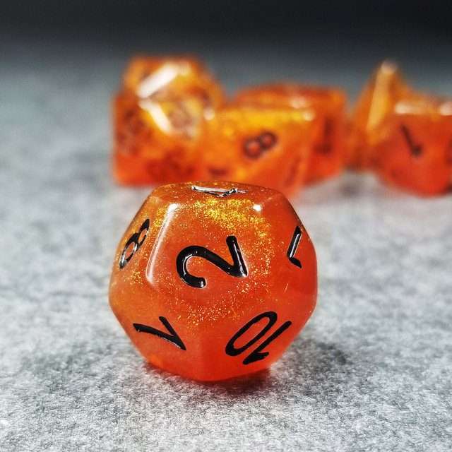 Sage’s Cantrips - Orange Glitter Gold Foil Black Ink Resin Polyhedral Dice Set - Sage's PortalResin Dice Set