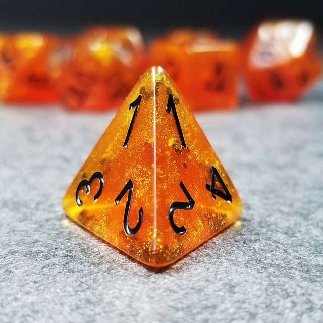 Sage’s Cantrips - Orange Glitter Gold Foil Black Ink Resin Polyhedral Dice Set - Sage's PortalResin Dice Set