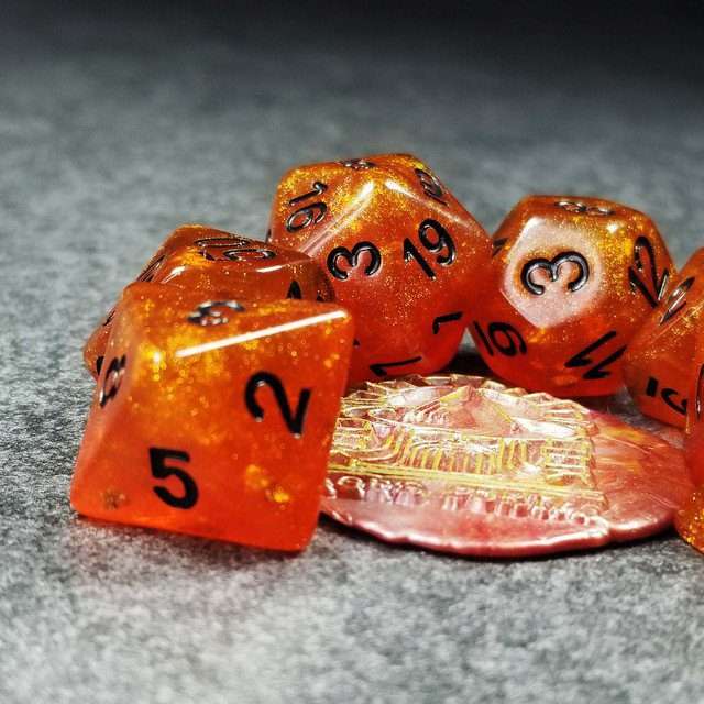 Sage’s Cantrips - Orange Glitter Gold Foil Black Ink Resin Polyhedral Dice Set - Sage's PortalResin Dice Set