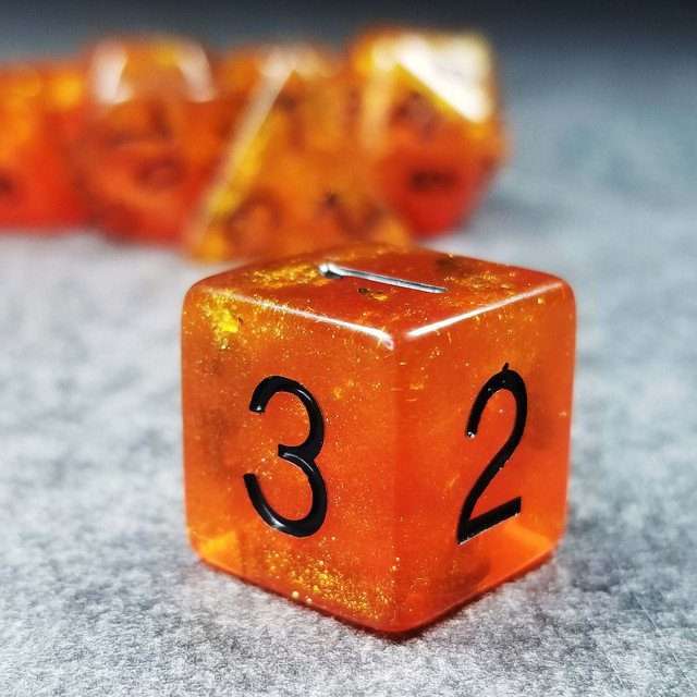 Sage’s Cantrips - Orange Glitter Gold Foil Black Ink Resin Polyhedral Dice Set - Sage's PortalResin Dice Set