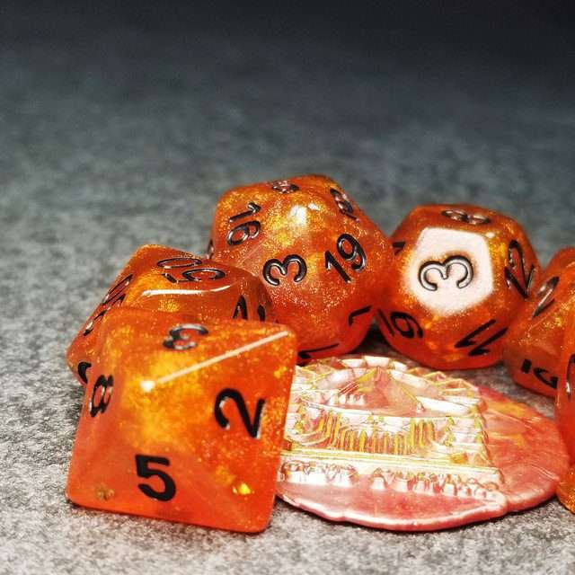 Sage’s Cantrips - Orange Glitter Gold Foil Black Ink Resin Polyhedral Dice Set - Sage's PortalResin Dice Set