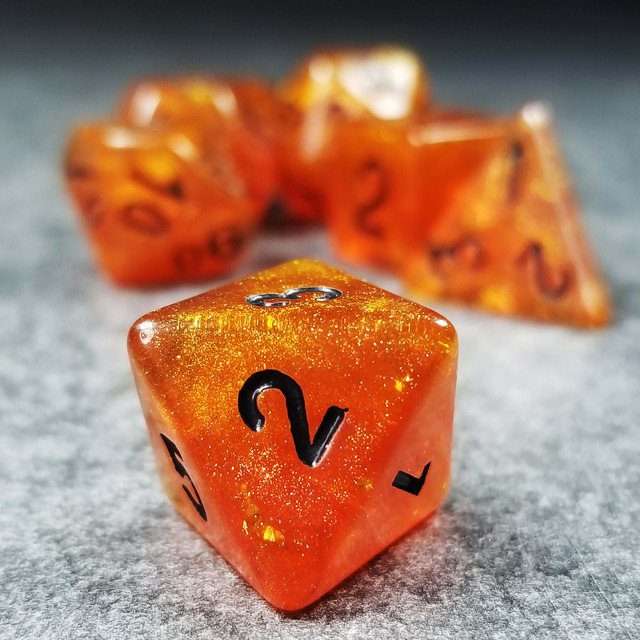 Sage’s Cantrips - Orange Glitter Gold Foil Black Ink Resin Polyhedral Dice Set - Sage's PortalResin Dice Set