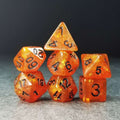 Sage’s Cantrips - Orange Glitter Gold Foil Black Ink Resin Polyhedral Dice Set - Sage's PortalResin Dice Set