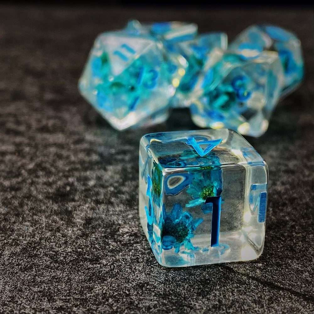 Sage's Cantrips - Transparent Blue Flowers and Blue Ink Polyhedral Dice Set - Sage's PortalResin Dice Set