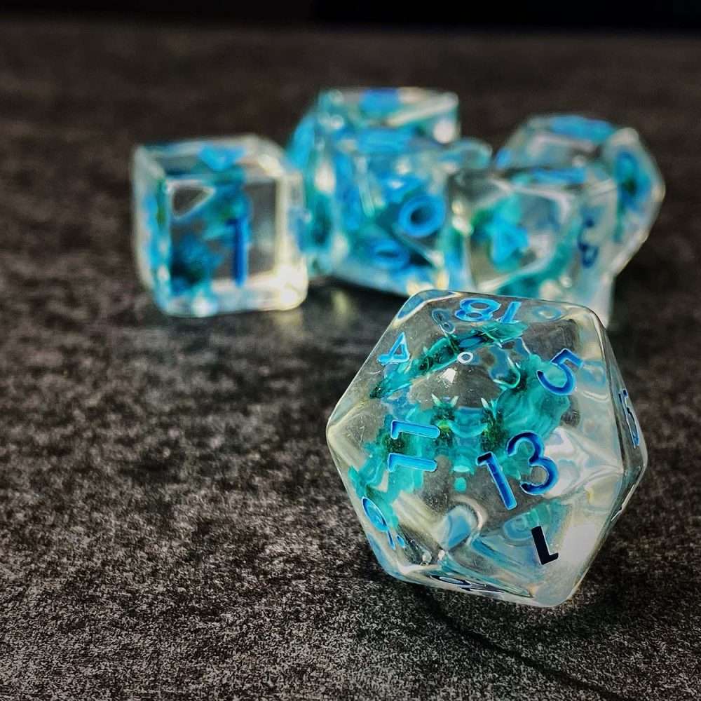 Sage's Cantrips - Transparent Blue Flowers and Blue Ink Polyhedral Dice Set - Sage's PortalResin Dice Set