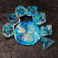 Sage's Cantrips - Transparent Blue Flowers and Blue Ink Polyhedral Dice Set - Sage's PortalResin Dice Set