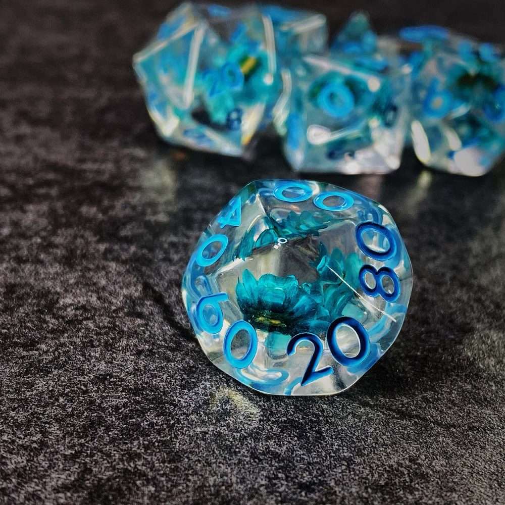 Sage's Cantrips - Transparent Blue Flowers and Blue Ink Polyhedral Dice Set - Sage's PortalResin Dice Set