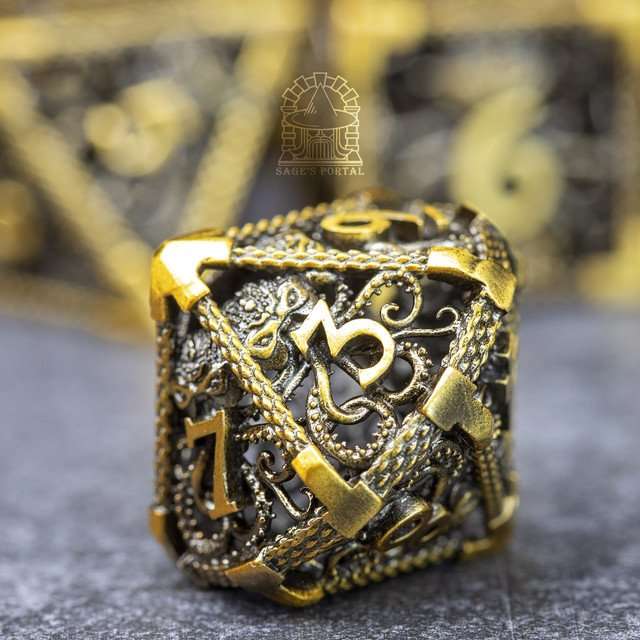 Sage's Cthulhu's Embrace Gold Hollow Metal Polyhedral Dice Set - Sage's PortalHollow Metal Dice Set
