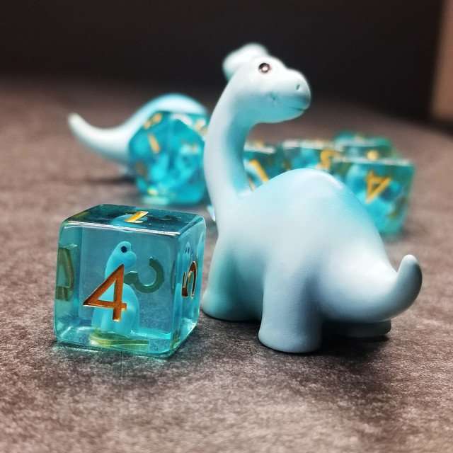 Sage's Familiars - Blue Baby Brachiosaurus Resin Polyhedral Dice Set - Sage's PortalResin Dice + Figurine Set