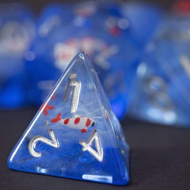 Sage's Familiars- Red Fish in Ocean Familiar Resin Polyhedral Dice Set - Sage's PortalResin Dice Set